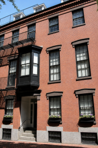 exterior of a brownstone apartment building in Beacon Hill, Boston MA